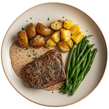 Steak au poivre, pommes de terre dorées et haricots verts au beurre